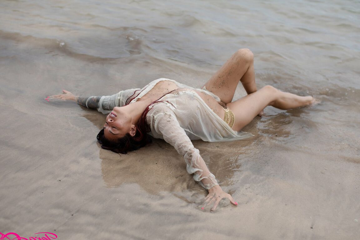 17P A beautiful day at the beach in my see thru shirt playing in the water