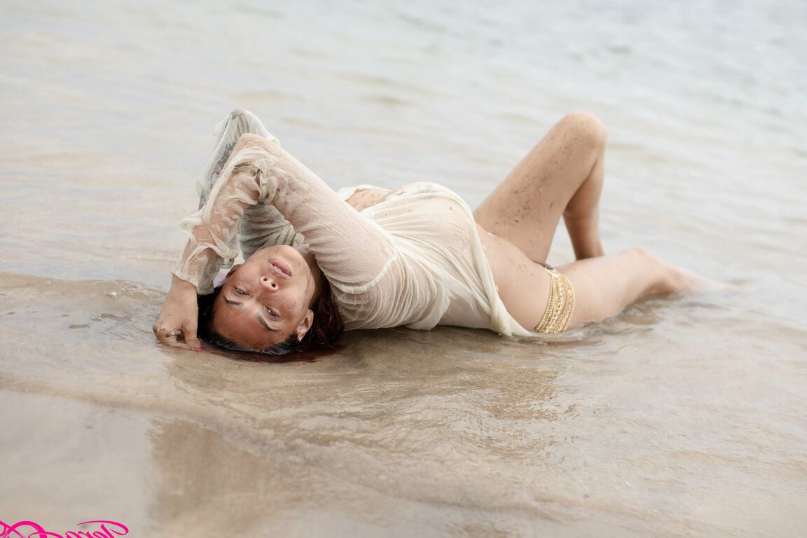 17P A beautiful day at the beach in my see thru shirt playing in the water