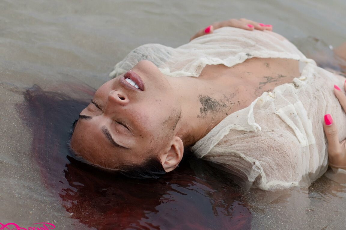 17P A beautiful day at the beach in my see thru shirt playing in the water