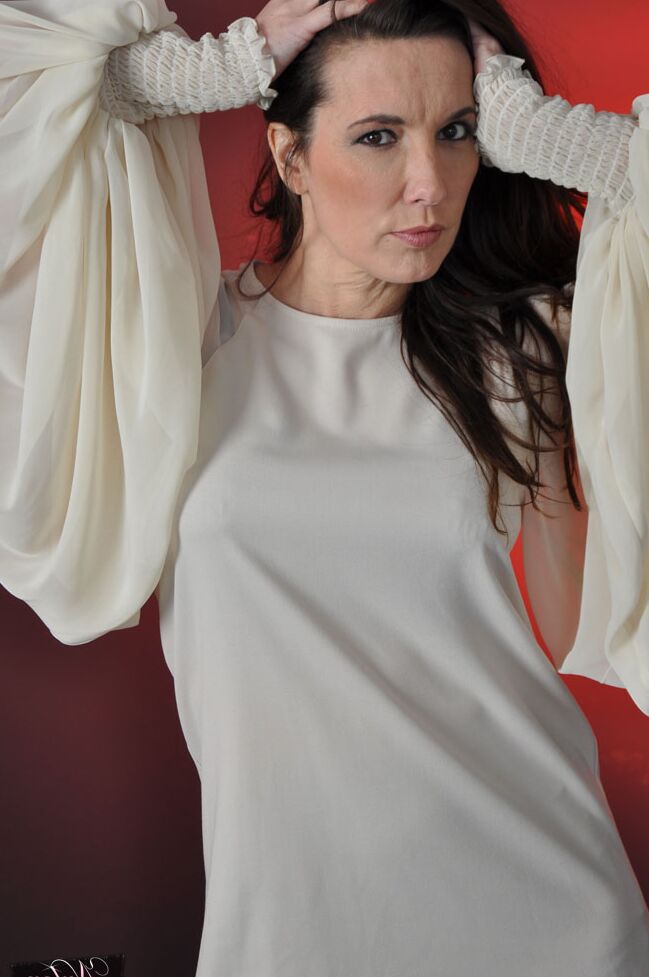 15P Clothed mature woman Nylon Jane models in nylons and heels