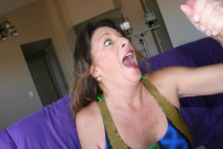 16P Lascivious fully clothed mature brunette strokong off a big cock