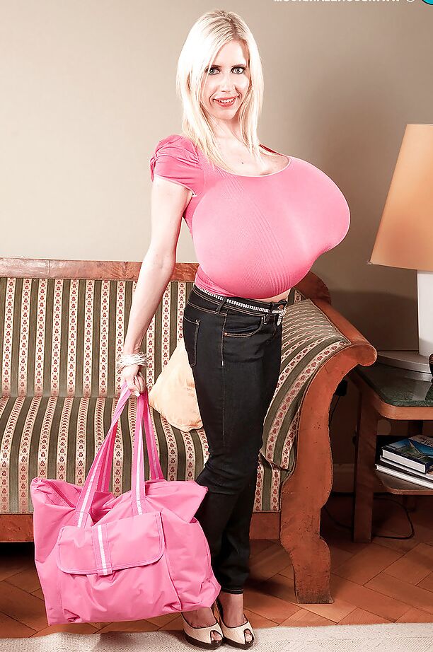 16P Mature blonde in tight jeans Beshine showing her extremely huge juggs