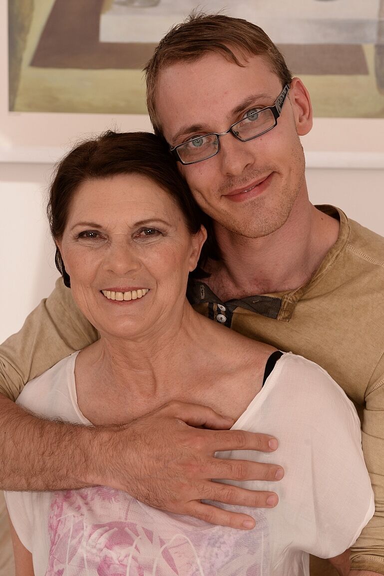 21P Brazen black haired granny Margo T. enjoys hairy pussy pounding from young guy