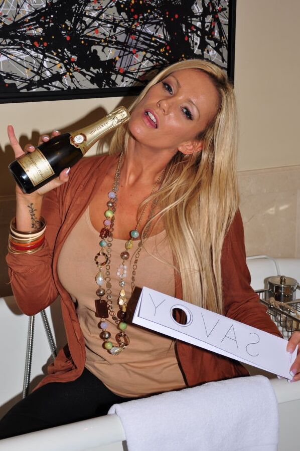 15P Sexy blonde Lucy Zara changes into nylon and garters after taking a bath