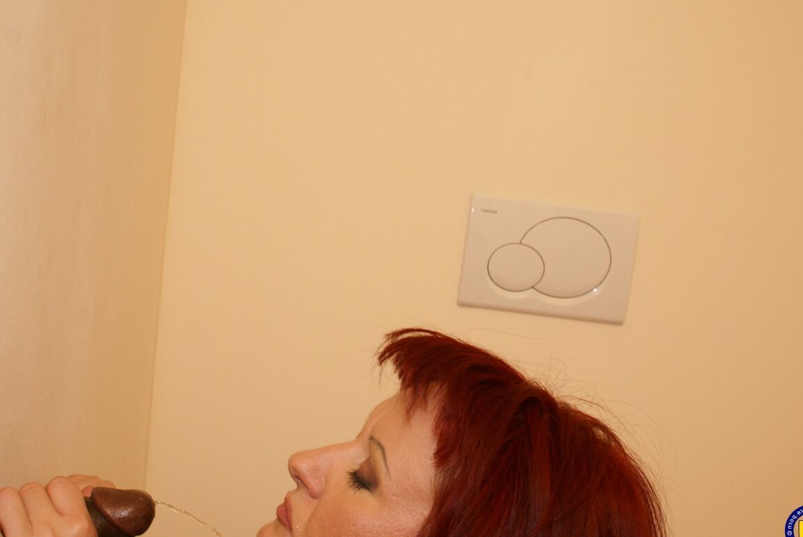 21P Busty redheaded mom Monika sucks and fucks a BBC she finds at a gloryhole
