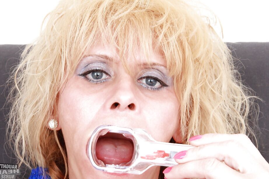 16P Sassy mature nurse stuffing her twat with a vibrator and gyno tools