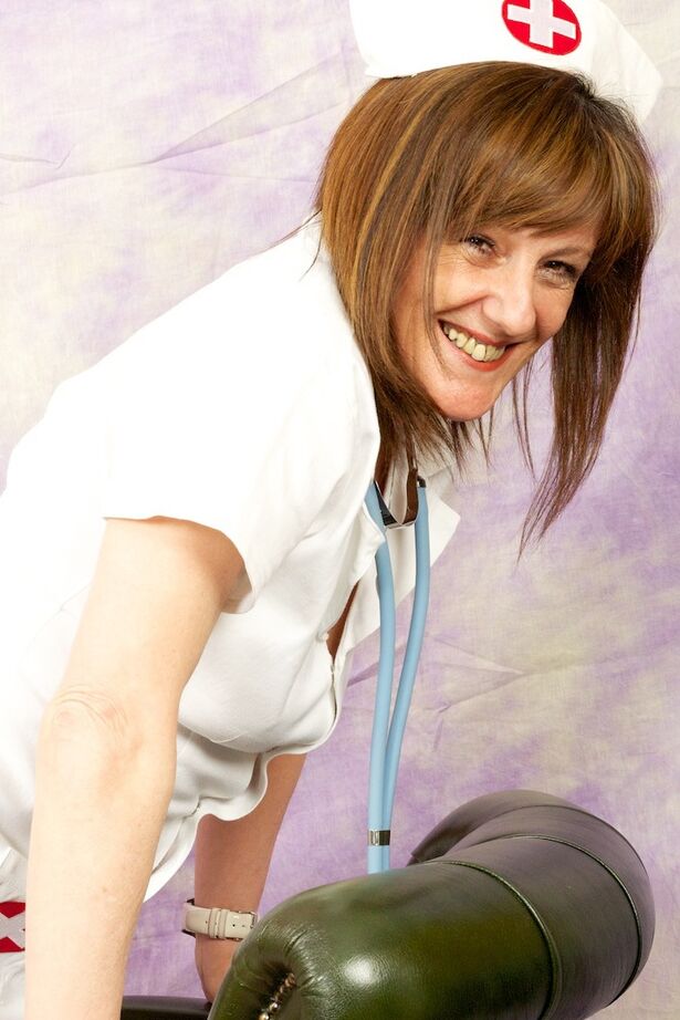 20P Older amateur Pandora masturbates while in her nurse's uniform