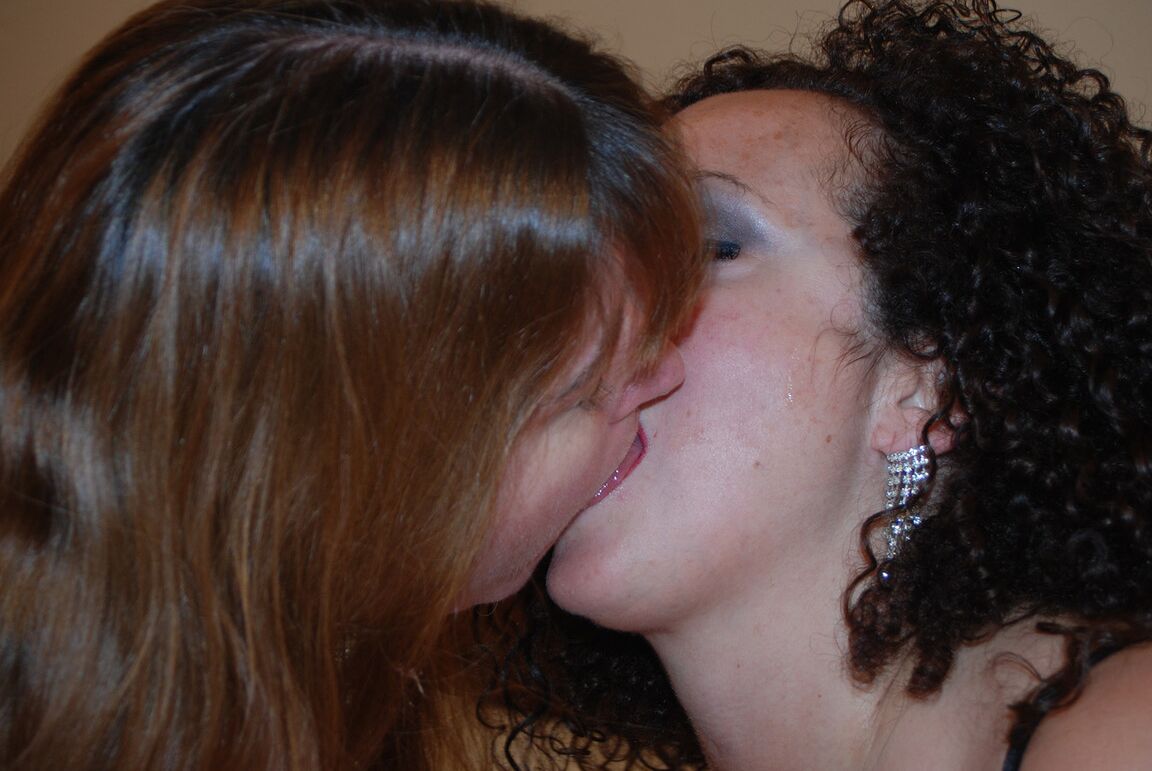 21P Lusty amateur wives French kiss before sharing a stud's cock in a threesome