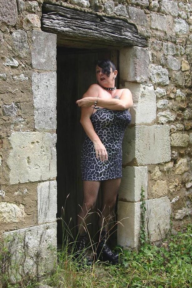 20P Mature BBW Mary Bitch takes a pee inside a root cellar in nylons and boots