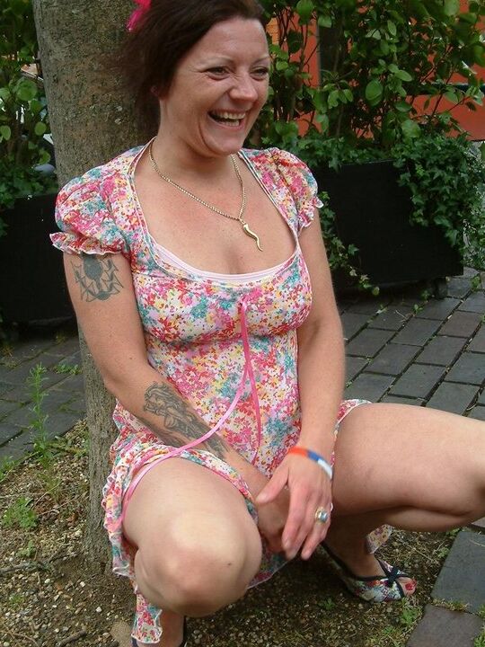12P Old British woman squats atop a beer bottle while masturbating in public