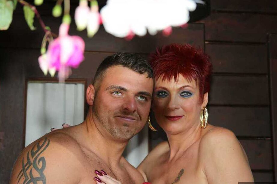 20P Mature redhead Dimonty gets pushed on a swing by her naked lover