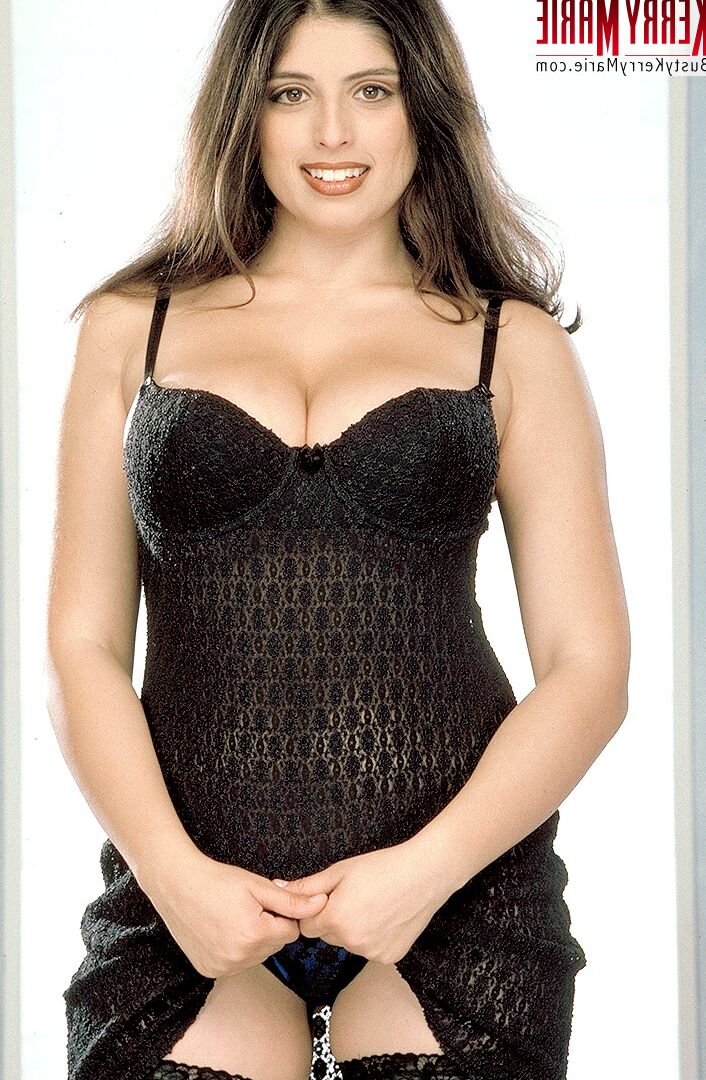 21P Charming MILF Kerry Marie strips to stockings & plays with her massive juggs