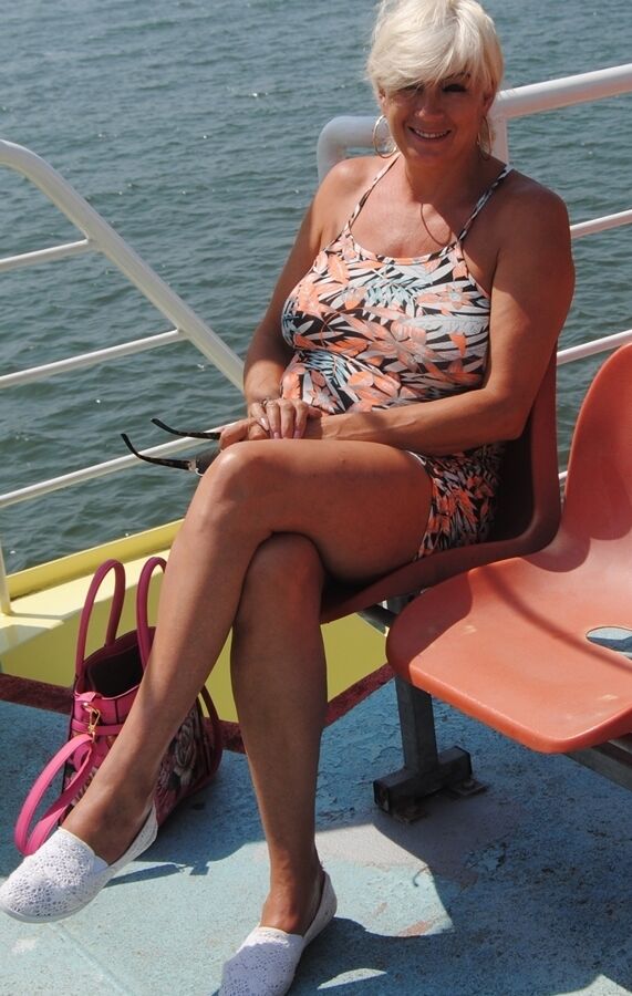 20P Short haired older lady Dimonty flashes no panty upskirts while out in public