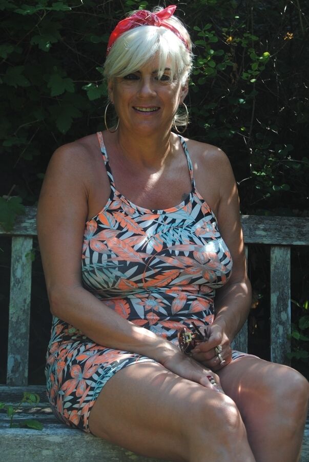 20P Short haired older lady Dimonty flashes no panty upskirts while out in public