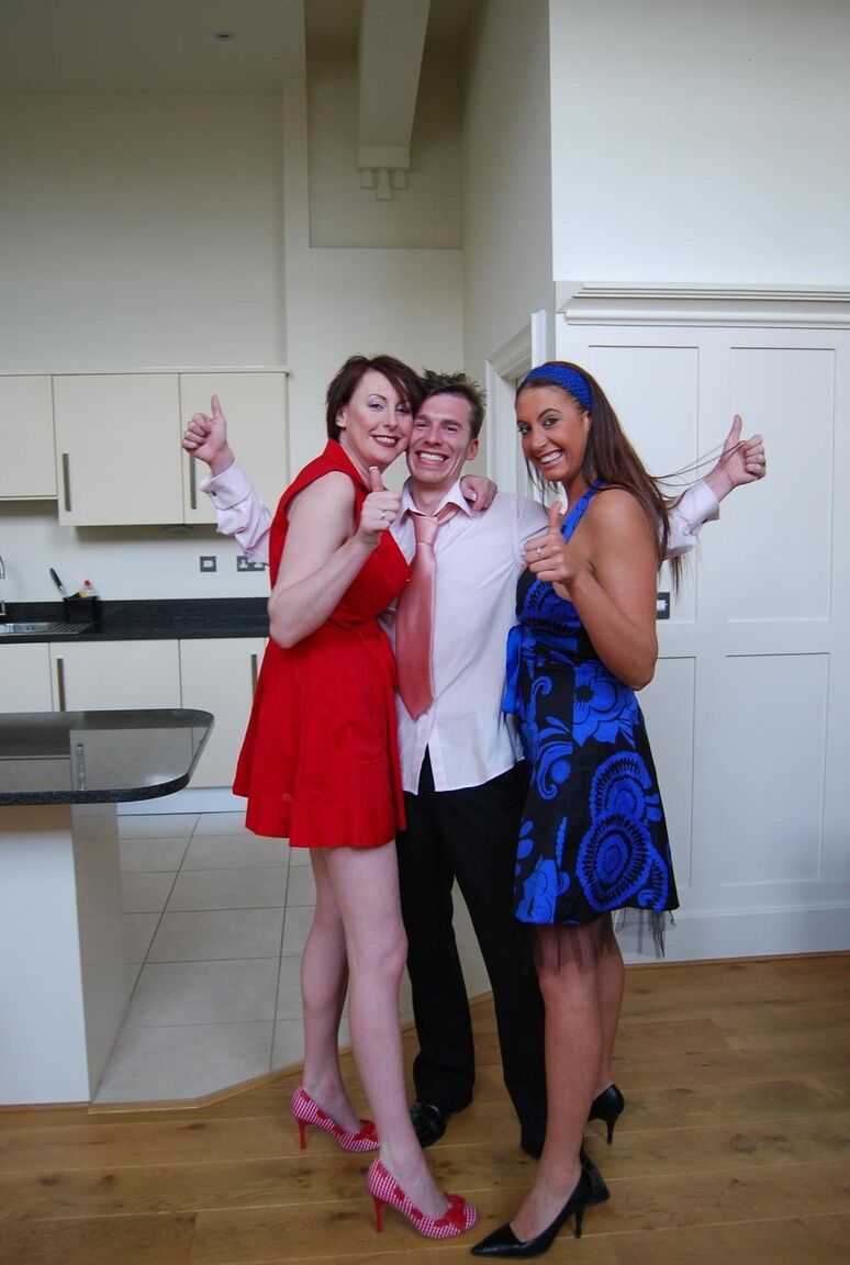15P Tall women take part in a threesome while garbed in garters and nylons