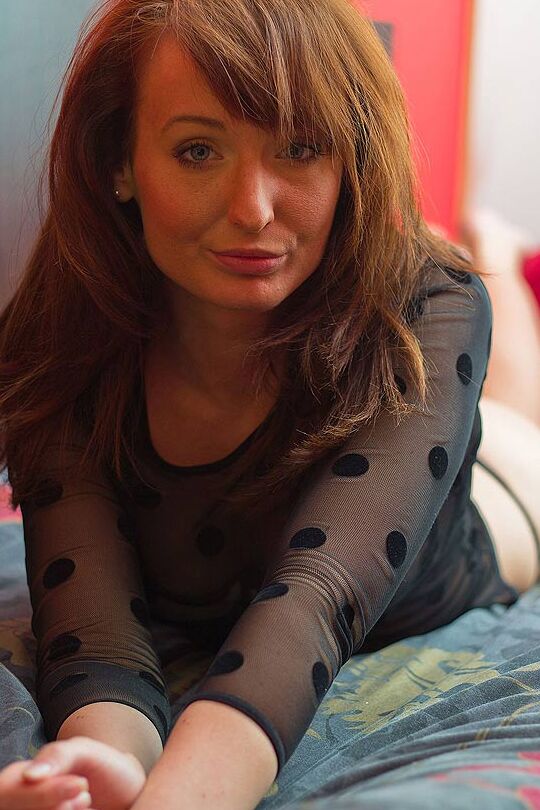 16P Mature redhead Viera Bella shows her bare legs while modelling non nude
