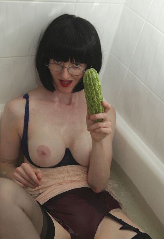 12P Dressed mature lady in black nylon stockings taking a bath