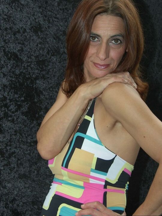 16P Middle-aged lady Jolanda slips of her dress before parting labia lips