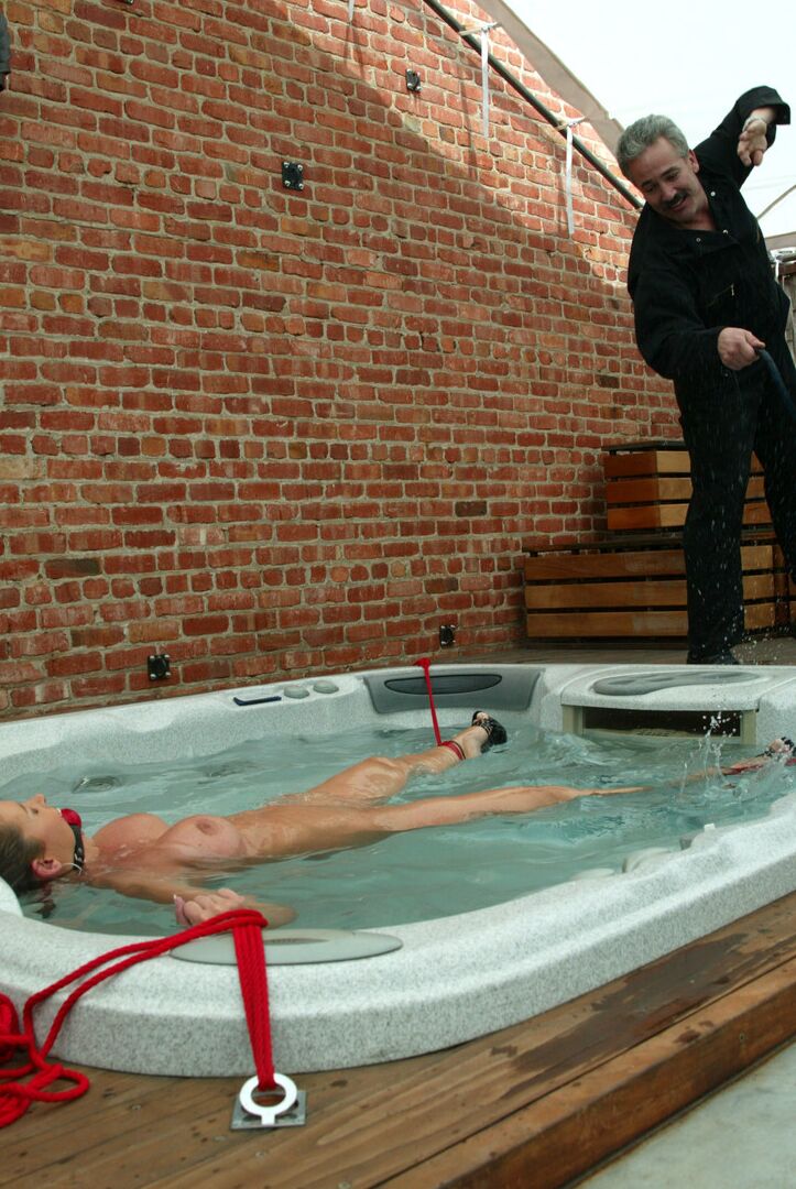 21P Hot Christina Carter reveal her juggs and gets tied up in an outdoor jacuzzi