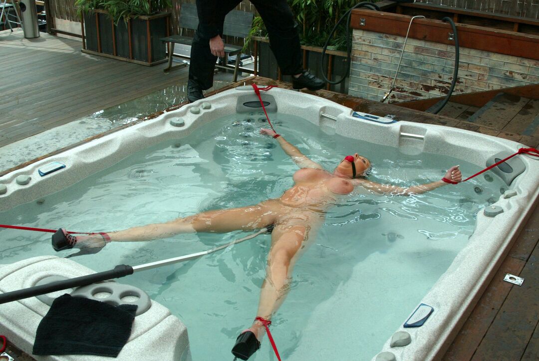 21P Hot Christina Carter reveal her juggs and gets tied up in an outdoor jacuzzi