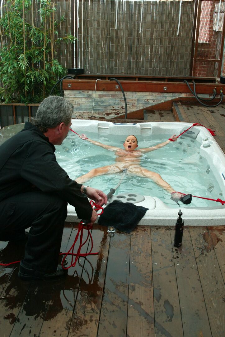 21P Hot Christina Carter reveal her juggs and gets tied up in an outdoor jacuzzi