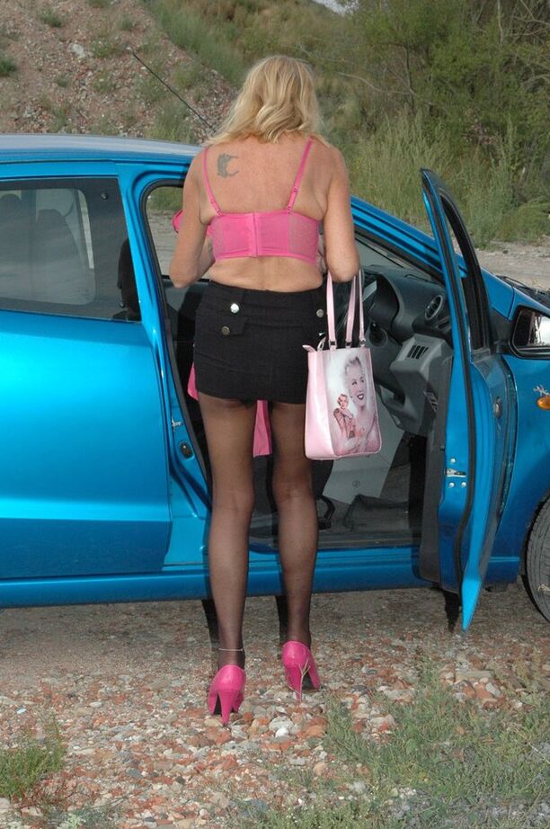 20P Mature blonde Kyras Nylons models in crotchless hose before getting in car