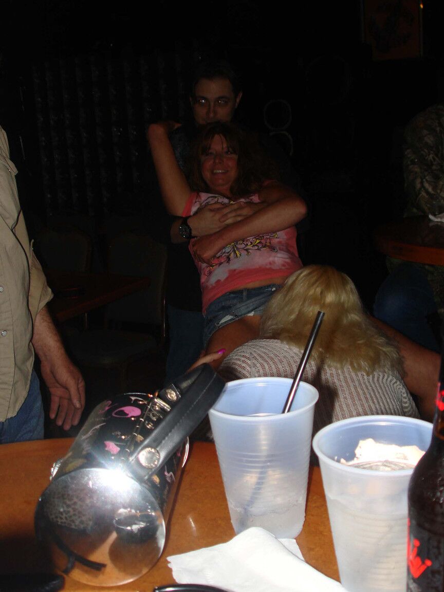 21P Swingers Double Dee & friends show their big tits & get eaten out at a club