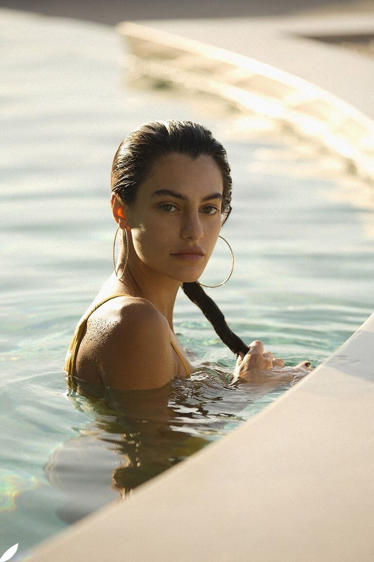 10P Gorgeous centerfold model Yasmina Jones bares her tits and ass after a swim