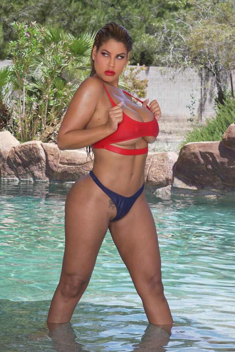 21P MILF with an amazing ass Bridgette B strips and shows her curves in the pool