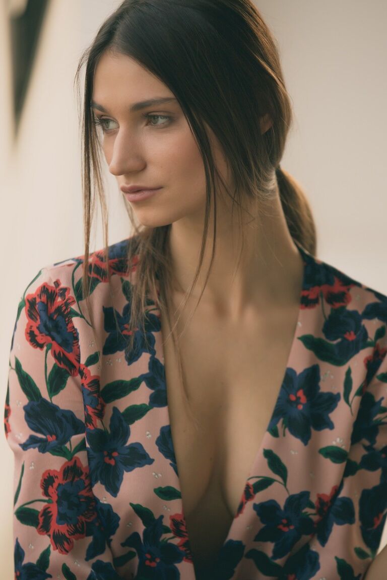 10P Adorable Playboy brunette named Ilvy Kokomo posing in a colorful dress