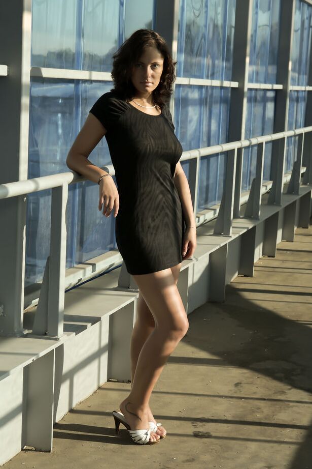 16P Teen model Eunice O uncovers her full breasts while getting naked on a walkway