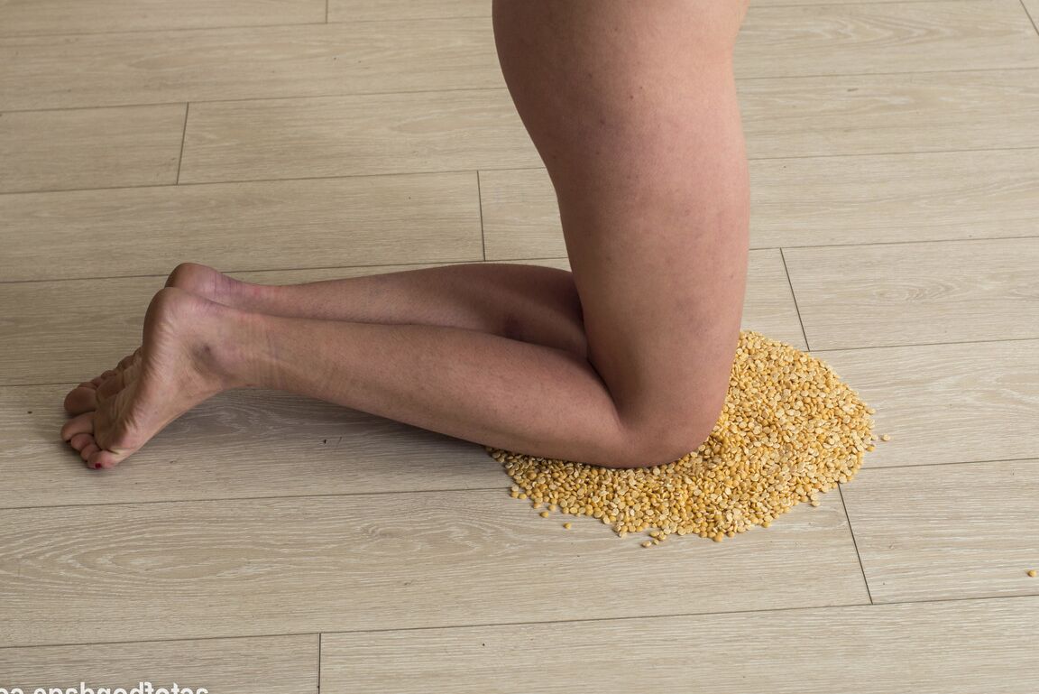 16P Natural redhead is forced to kneels on peas with hairy body exposed