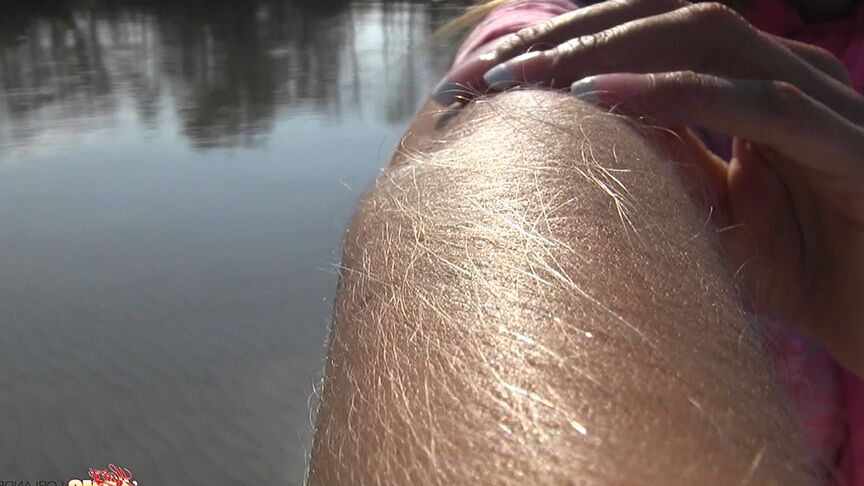 14P Amateur chick Lori Anderson shows off incredibly hairy forearms by the water
