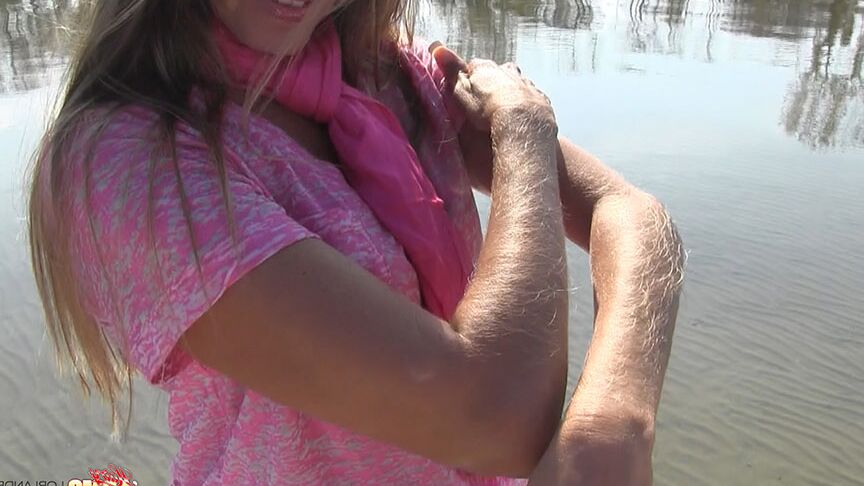 14P Amateur chick Lori Anderson shows off incredibly hairy forearms by the water