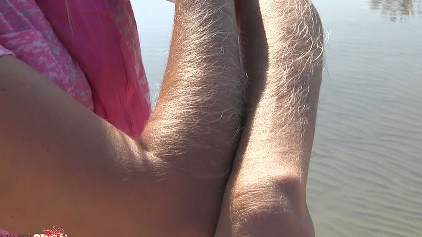 14P Amateur chick Lori Anderson shows off incredibly hairy forearms by the water