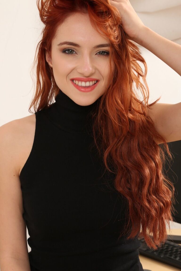 21P Model with red wavy hair Sophia Blake undresses & poses in sheer tights