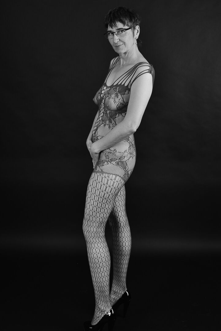 20P Older amateur releases her saggy breasts from a crotchless bodystocking