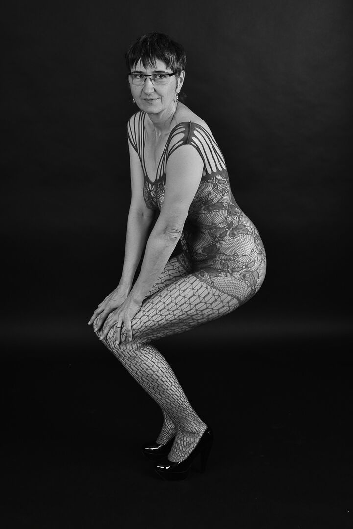 20P Older amateur releases her saggy breasts from a crotchless bodystocking