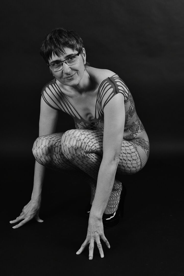 20P Older amateur releases her saggy breasts from a crotchless bodystocking