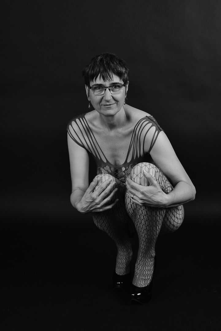 20P Older amateur releases her saggy breasts from a crotchless bodystocking