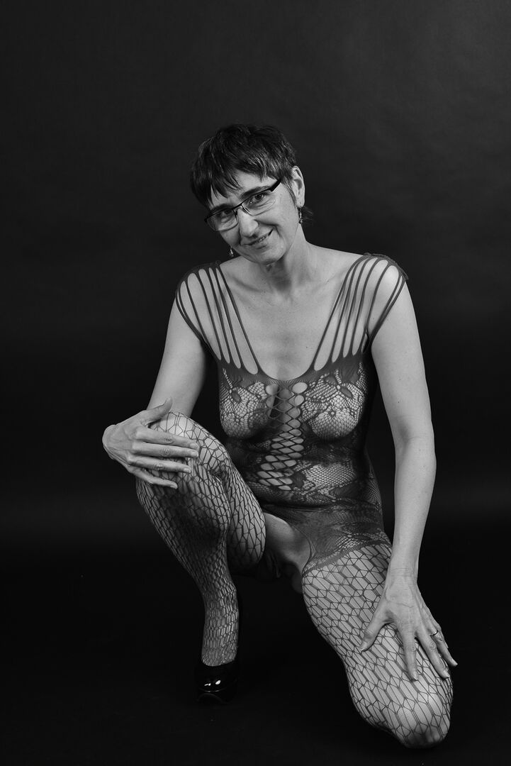 20P Older amateur releases her saggy breasts from a crotchless bodystocking