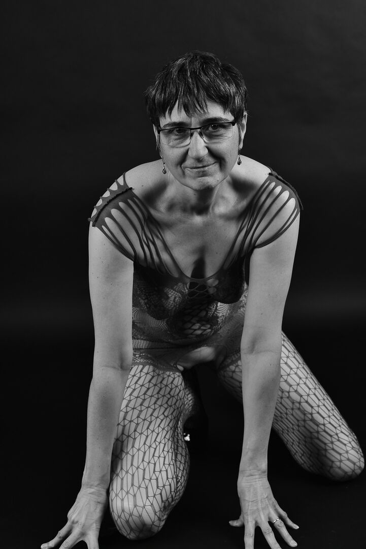 20P Older amateur releases her saggy breasts from a crotchless bodystocking