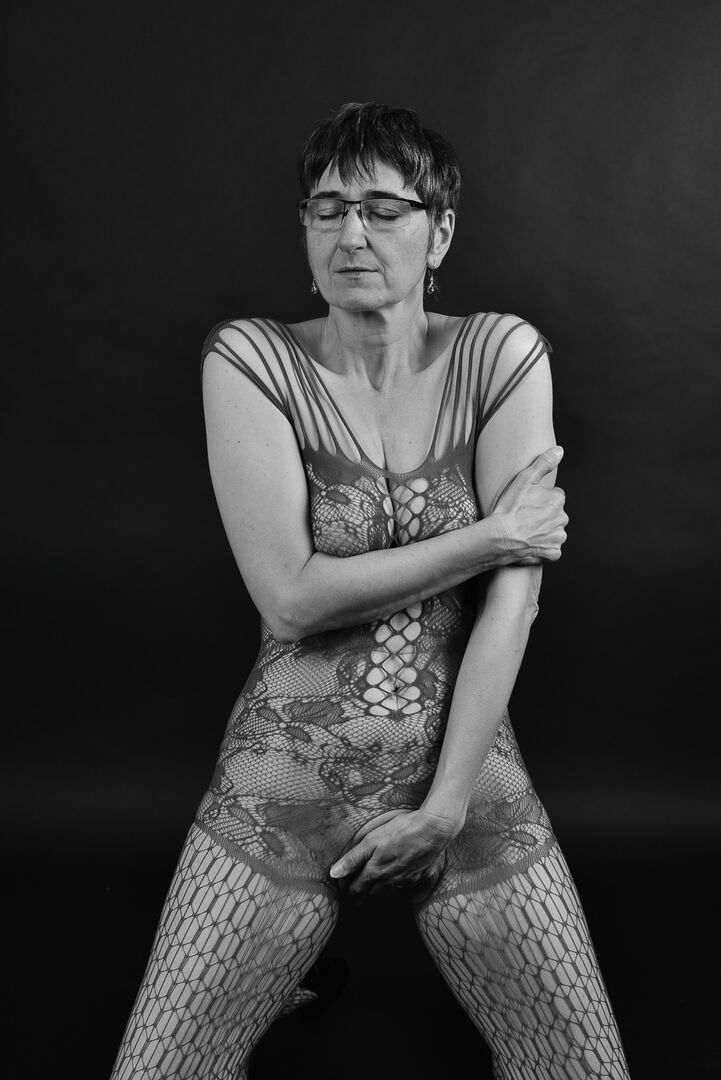 20P Older amateur releases her saggy breasts from a crotchless bodystocking