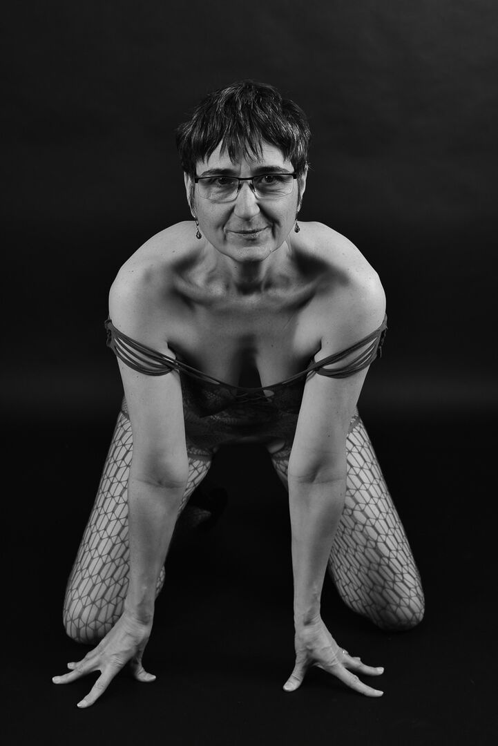 20P Older amateur releases her saggy breasts from a crotchless bodystocking