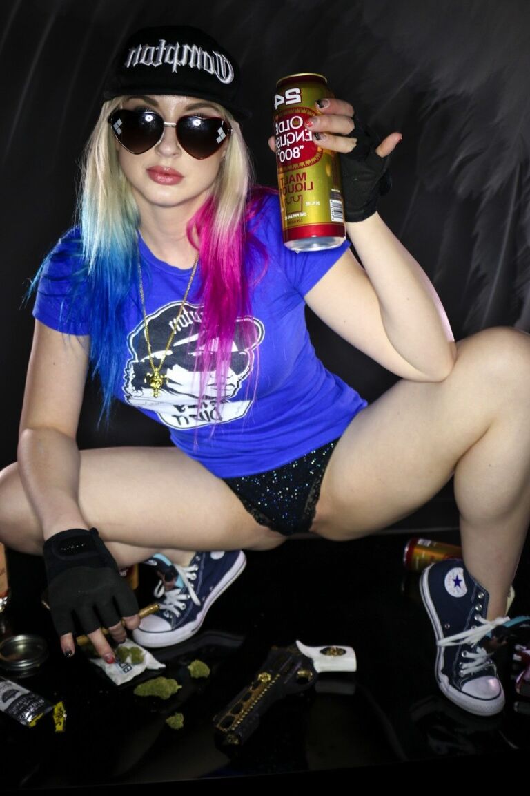 12P Blonde chick Leya Falcon holds pistols & booze while showing her tits and twat