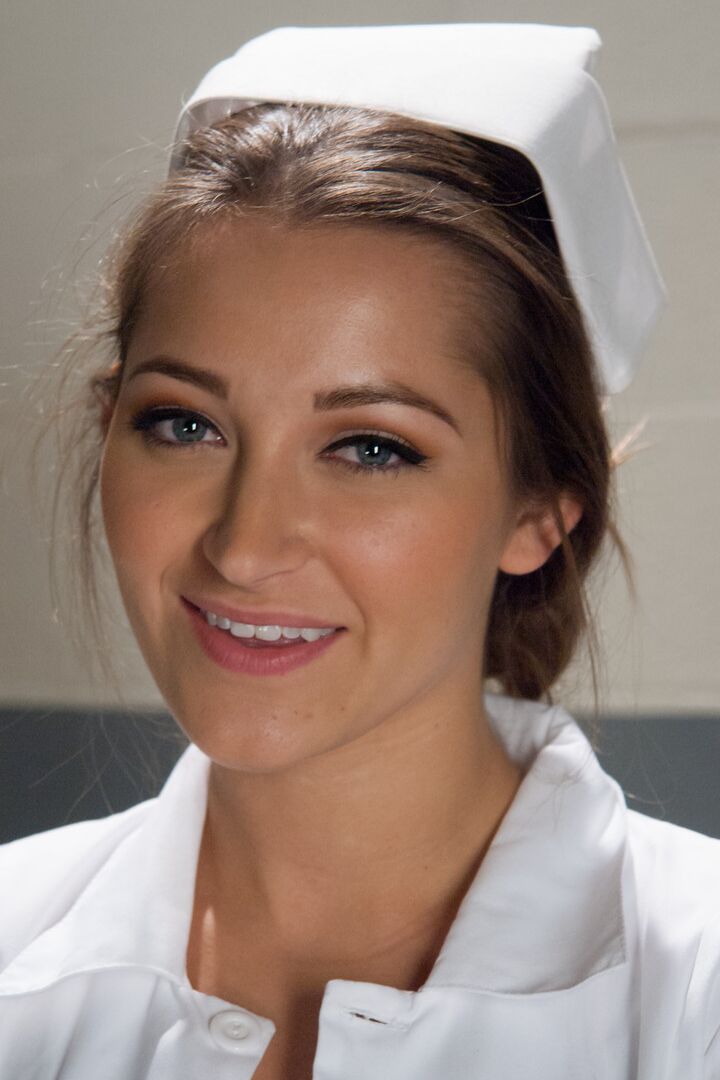 20P Gorgeous nurse with a nice butt Dani Daniels strips and poses in high heels