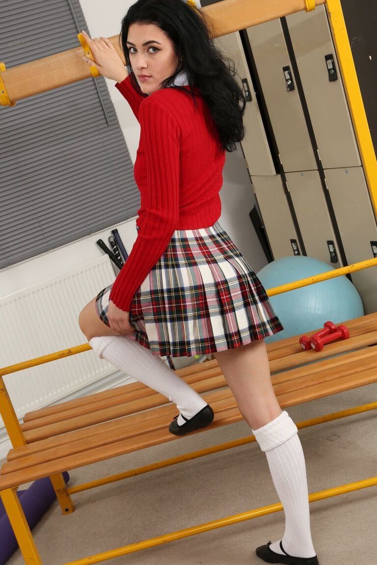 21P Schoolgirl Maryanna undressing in the locker room and posing in thong panties