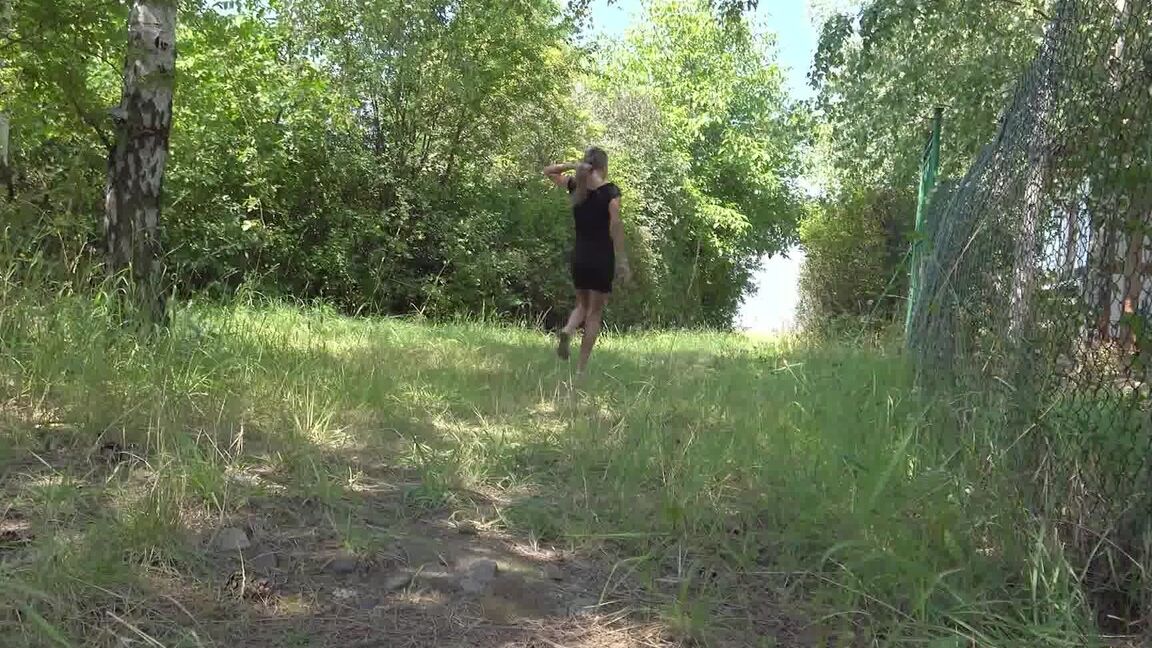 15P Sarah Key leans against a tree and pees