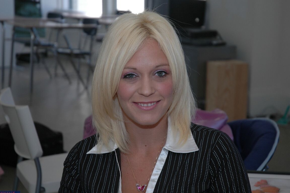 17P Blonde teacher Charlee Chase undresses at work to free her large breasts