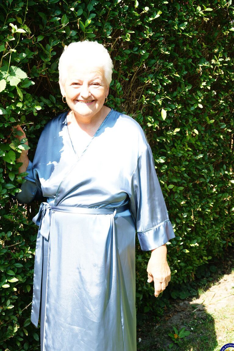 21P Crazy old granny Vera D drops her robe and masturbates in the back yard